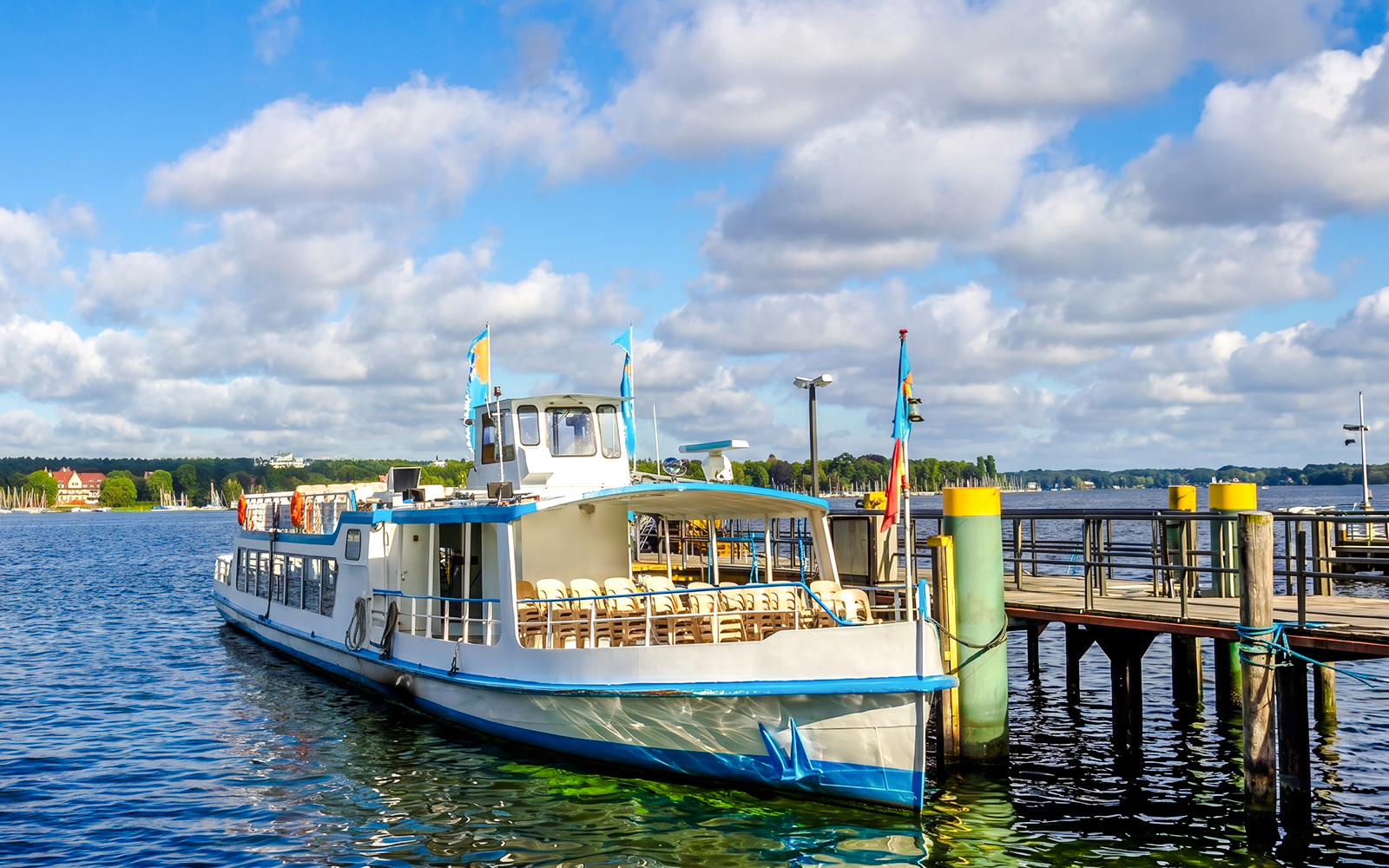 Cruise boat docked at Wannsee for Seven Lakes Tour from Berlin.