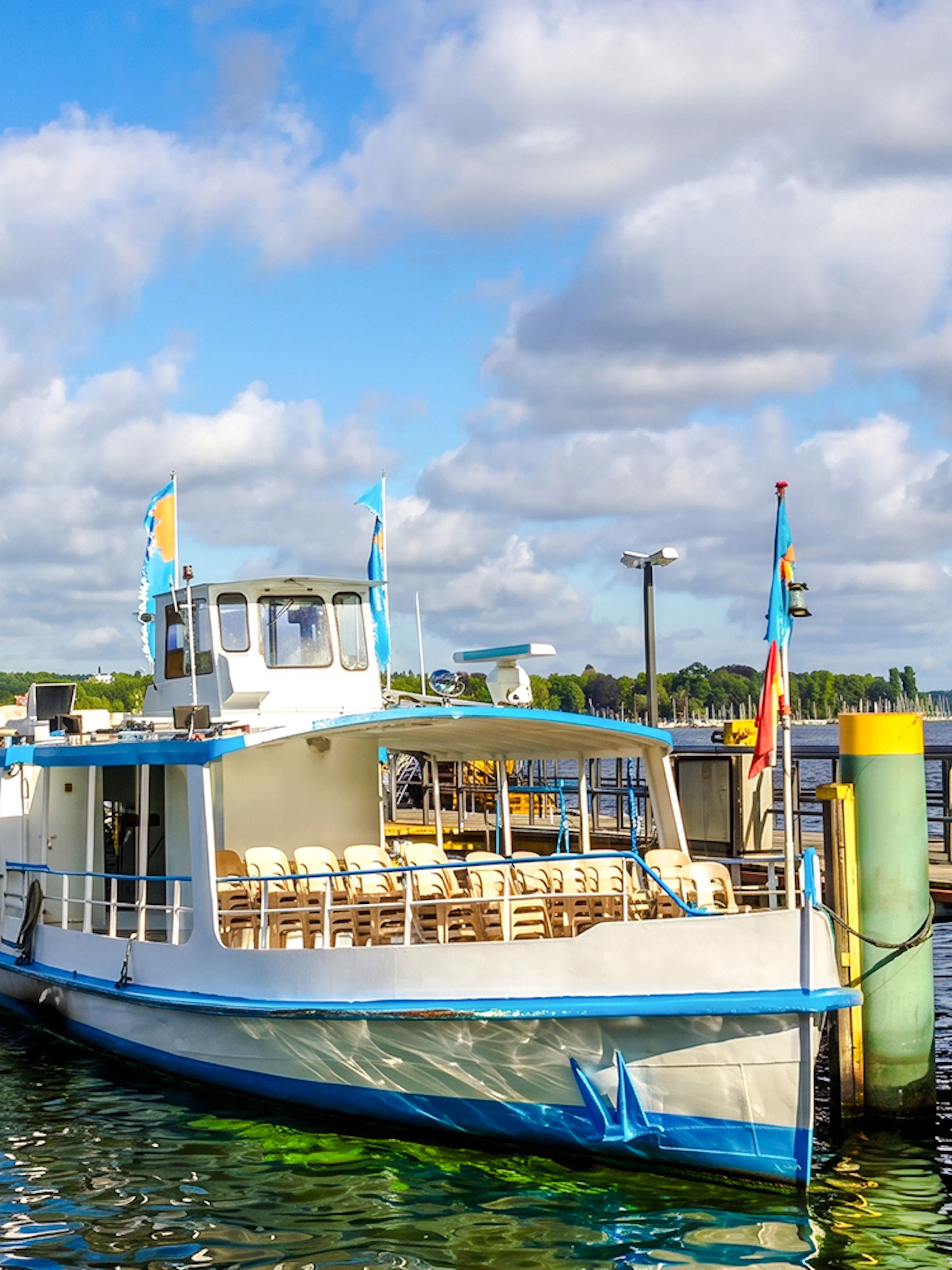 Cruise boat docked at Wannsee for Seven Lakes Tour from Berlin.