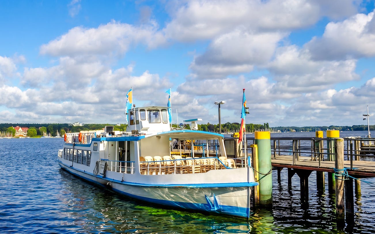 Cruise boat docked at Wannsee for Seven Lakes Tour from Berlin.