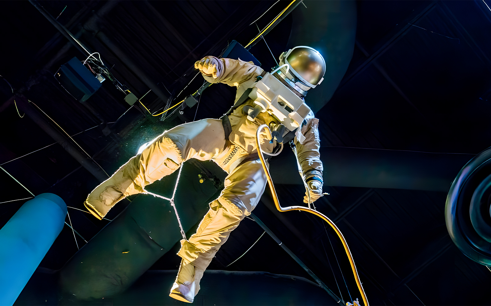 Space suit exhibit with wires connected at Houston Space Center