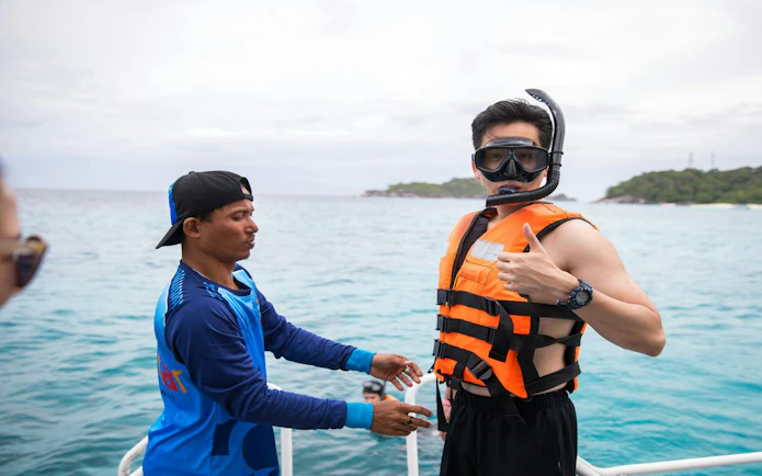 Snorkeler preparing for Similan Islands day trip by speedboat from Phuket.