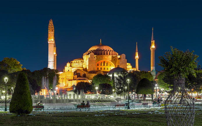 Hagia Sophia illuminated at night during Istanbul's Two Continents Evening Bus Tour.