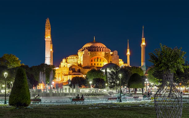 Hagia Sophia illuminated at night during Istanbul's Two Continents Evening Bus Tour.