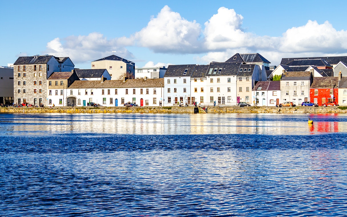 Colorful houses along the waterfront in Galway City, Ireland.