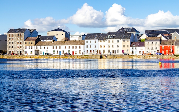 Colorful houses along the waterfront in Galway City, Ireland.