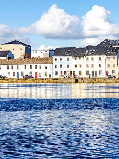 Colorful houses along the waterfront in Galway City, Ireland.
