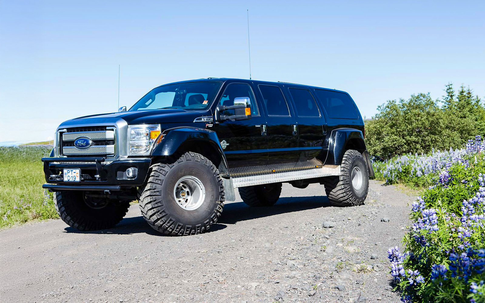Jeep used for Secret Lagoon hot spring and glacier snowmobile tour in Iceland.