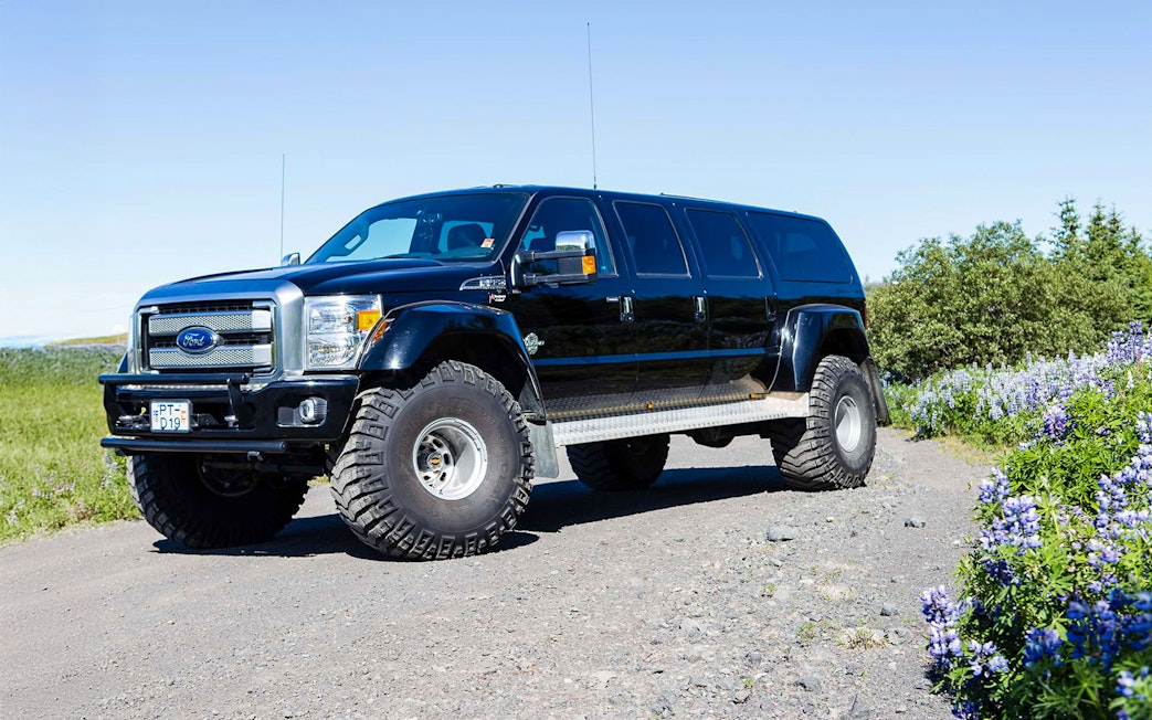 Jeep used for Secret Lagoon hot spring and glacier snowmobile tour in Iceland.