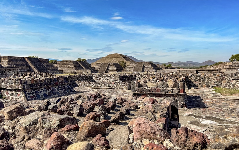 Ruins with Pyramid of the Sun in background, Teotihuacan, Mexico.