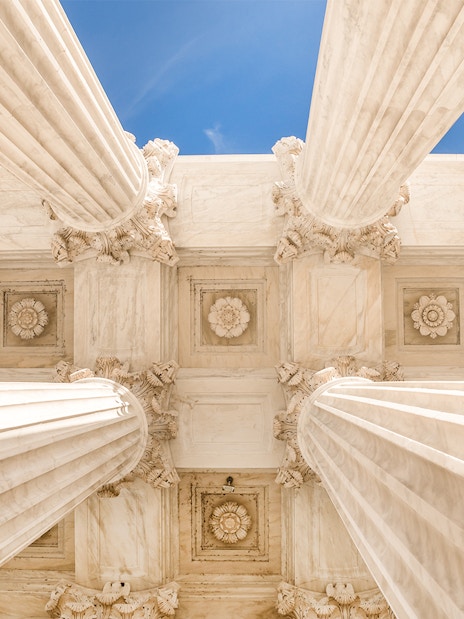 Supreme Court building pillars and architectural details in Washington DC.