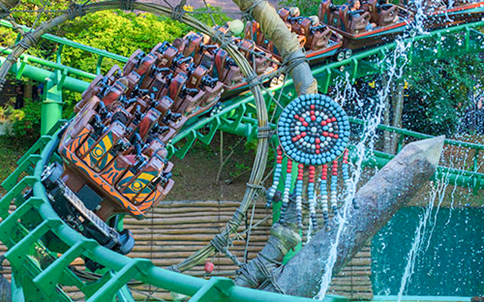 Roller coaster on Shaman ride at Gardaland, Verona with dreamcatcher decoration.