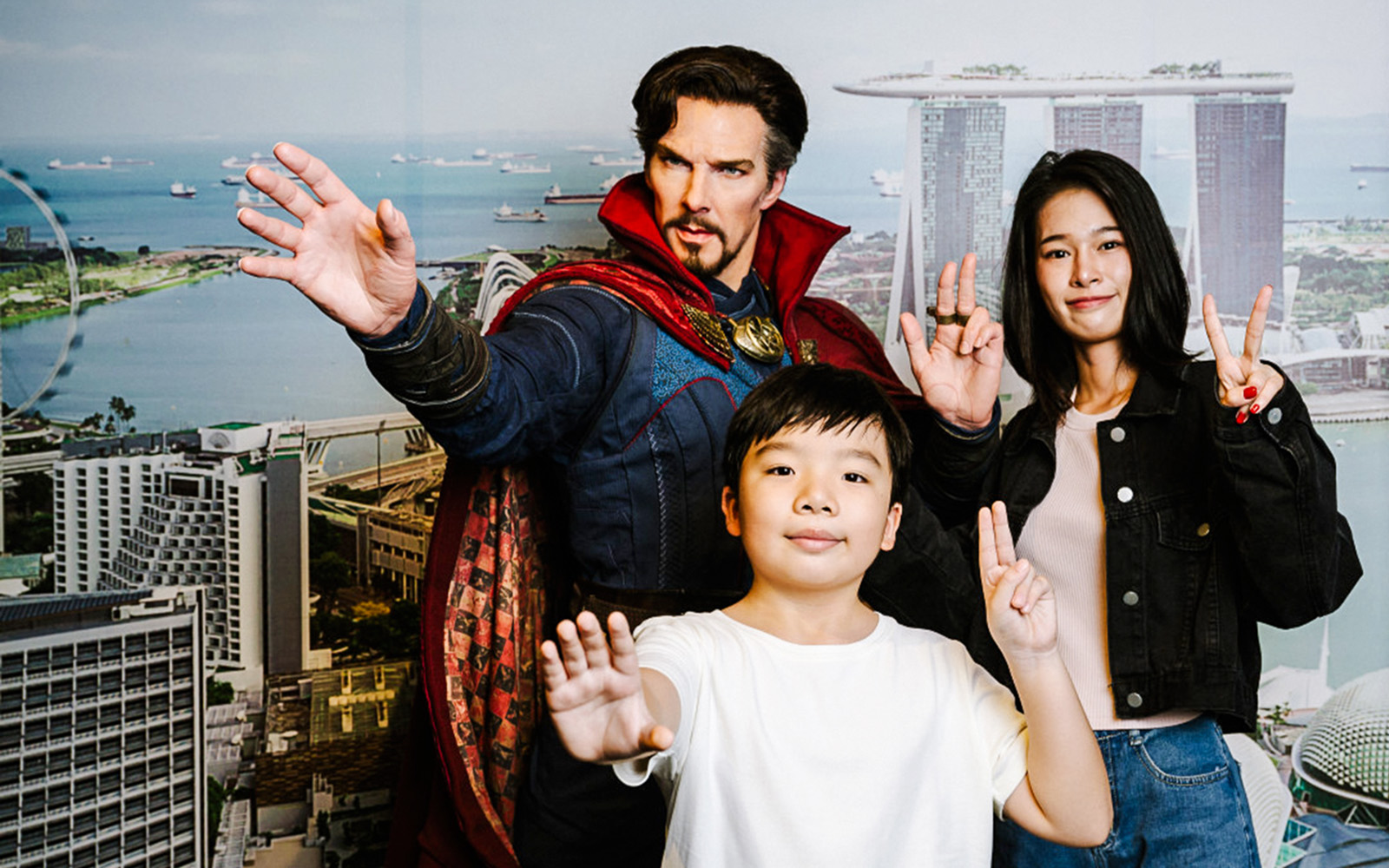Doctor Strange wax figure with visitors at Madame Tussauds Singapore.