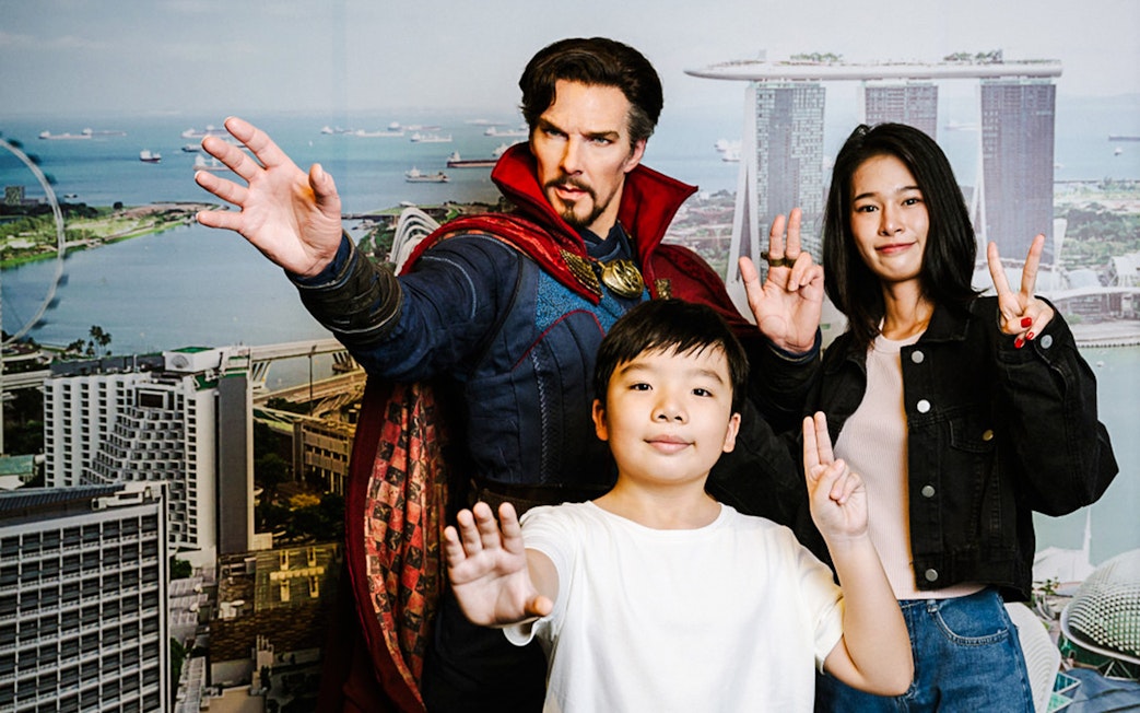 Doctor Strange wax figure with visitors at Madame Tussauds Singapore.