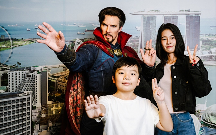 Doctor Strange wax figure with visitors at Madame Tussauds Singapore.