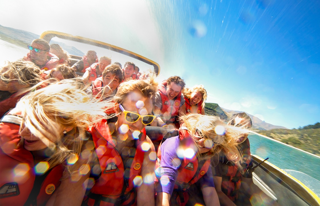 Guests on a jet boat ride on Kawarau and Shotover Rivers, New Zealand.