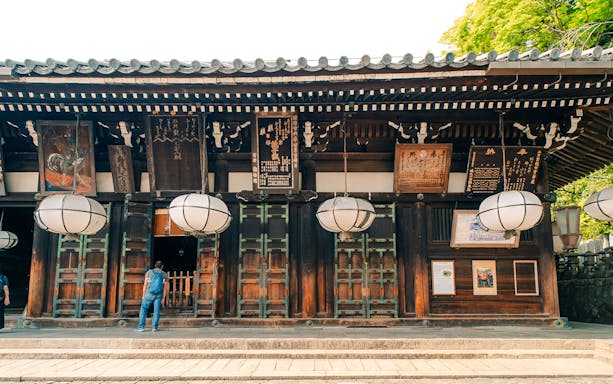 Tōdai-ji Temple entrance with traditional lanterns and wooden architecture in Nara, Japan.