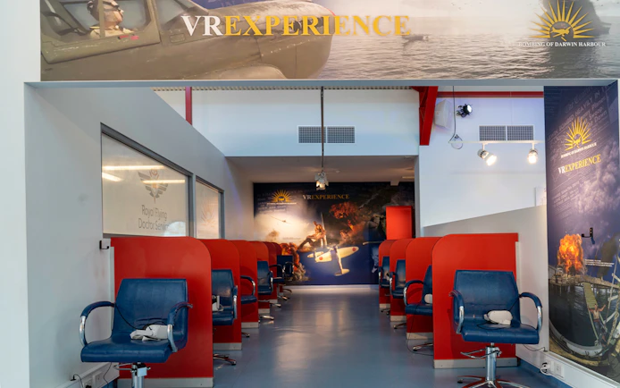 VR experience area at Darwin Royal Flying Doctor Service with seating and headsets.