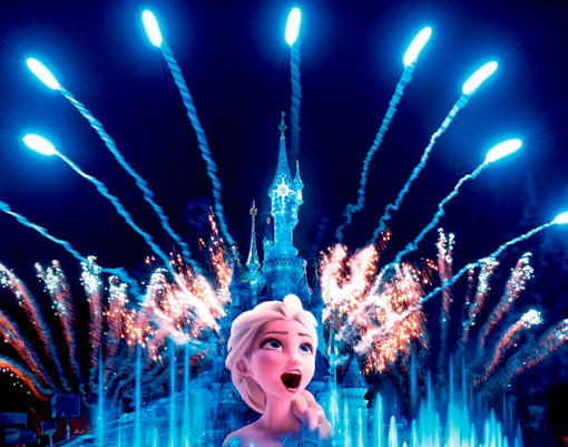 Frozen-themed light show on Sleeping Beauty Castle, Disneyland Paris.