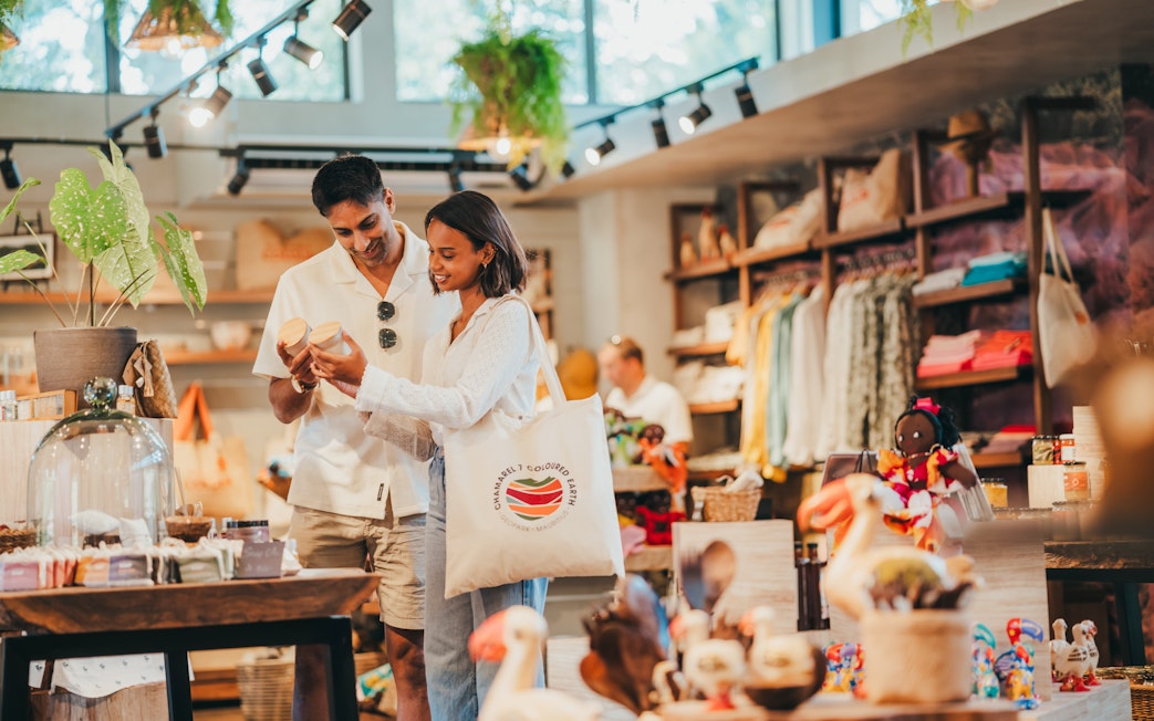 Couple shopping at Chamarel 7 Coloured Earth Souvenir Shop, Mauritius.
