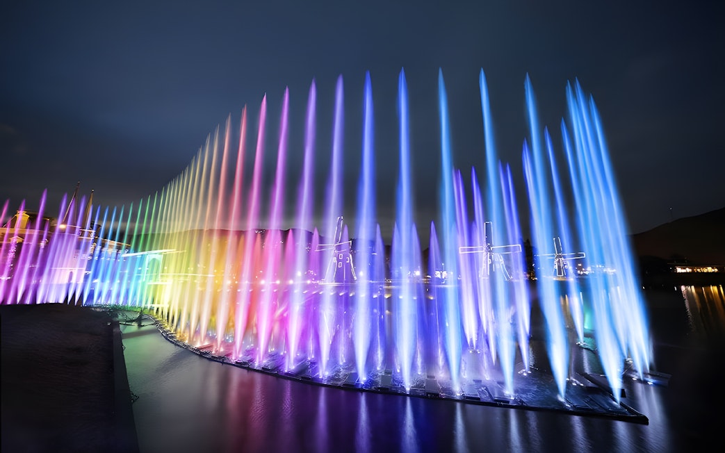 Fountain light show with rainbow colors at Nagasaki Huis Ten Bosch.