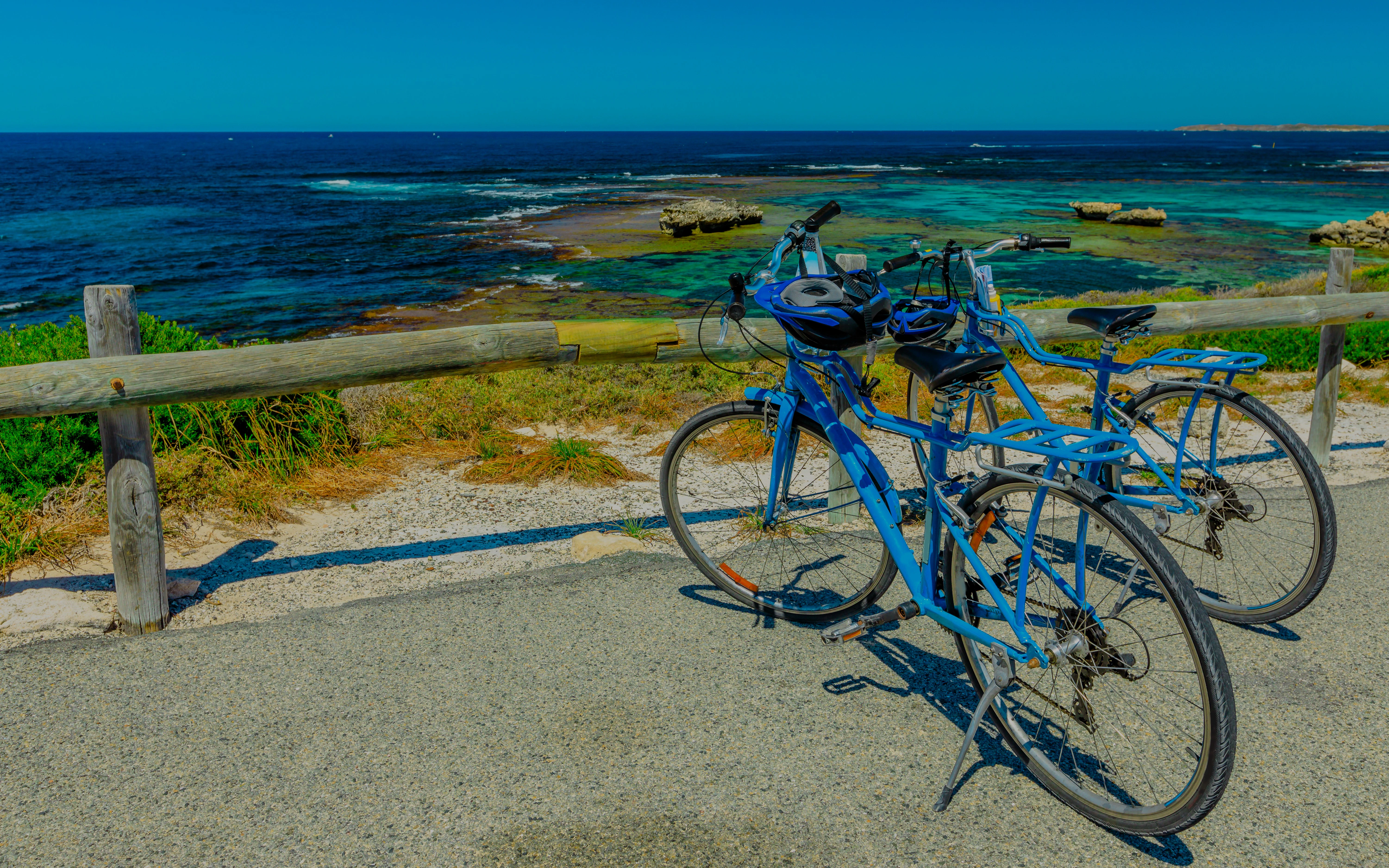 Bicycles parked at Parker Point with ocean view in the background.