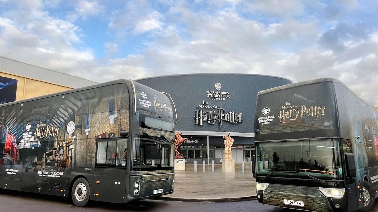 Coaches parked in front of the Harry Potter Warner Bros. Studio Tour entrance in London.