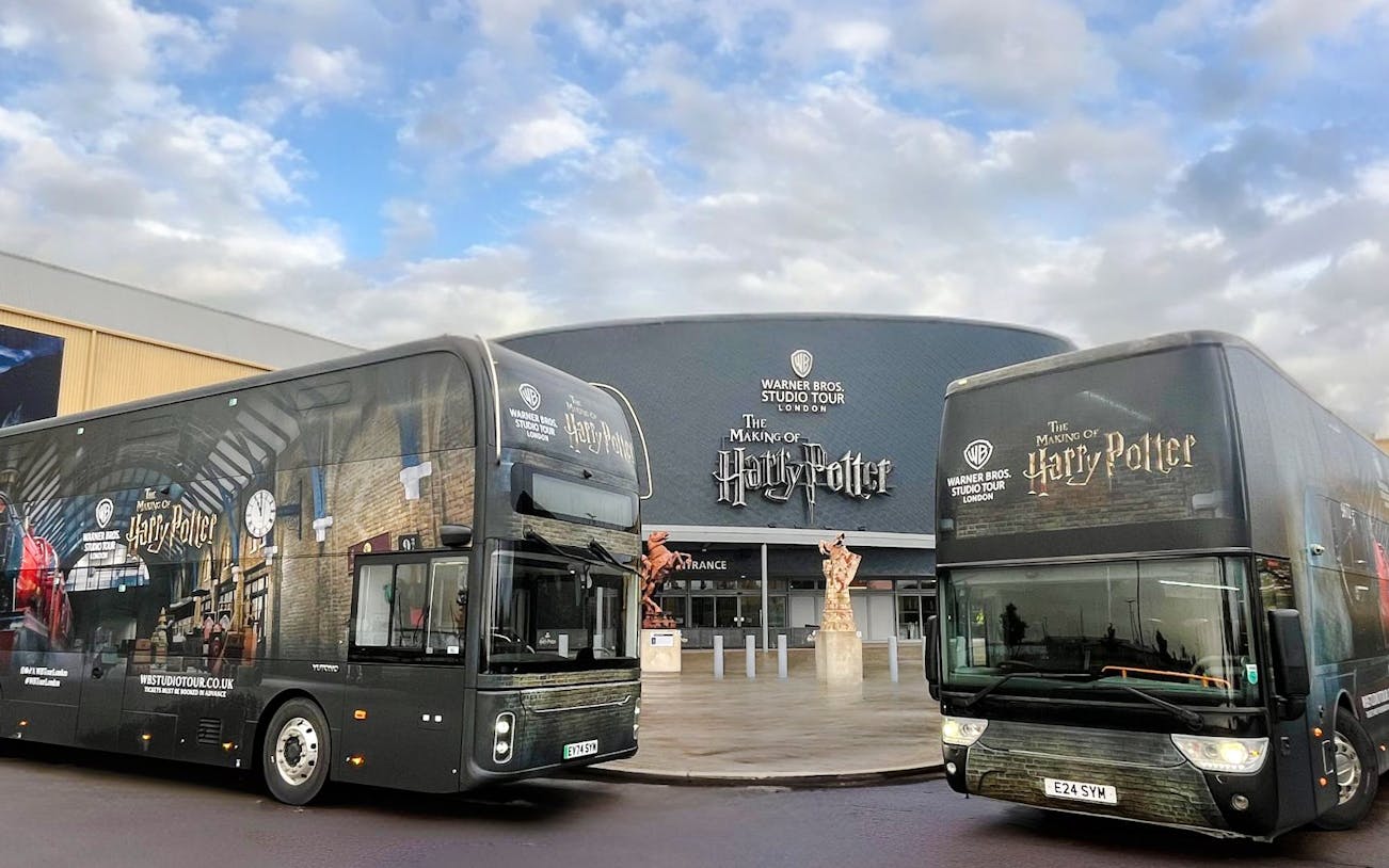 Coaches parked in front of the Harry Potter Warner Bros. Studio Tour entrance in London.