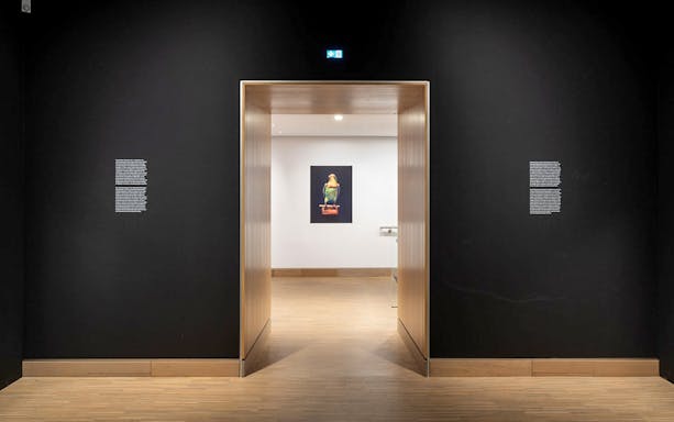 Exhibit entrance at ALBERTINA MODERN Vienna with artwork in view.