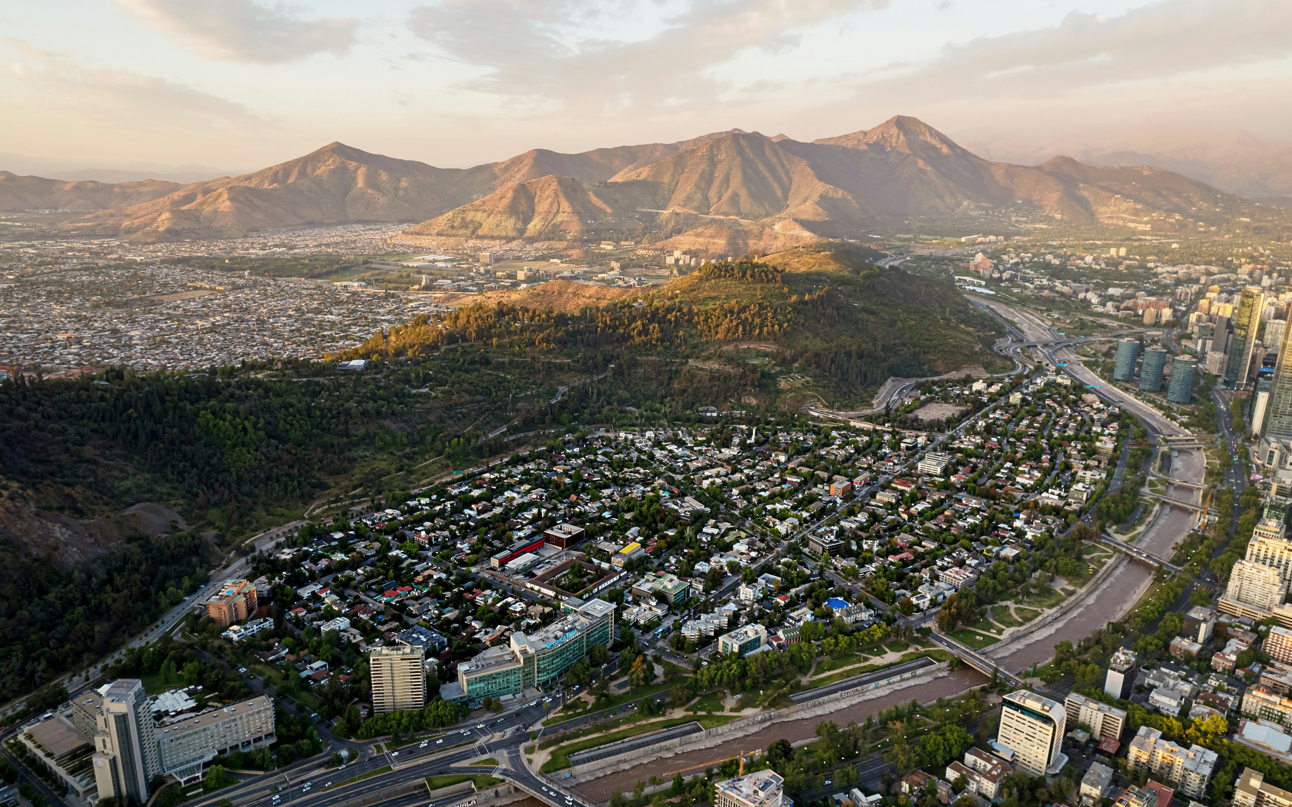 Aerial view of San Cristobal Hill and Santiago de Chile cityscape.