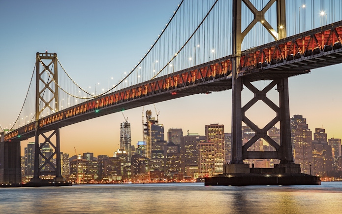 Bay Bridge at sunset with San Francisco skyline, Big Bus 1-Hr Sunset Tour.