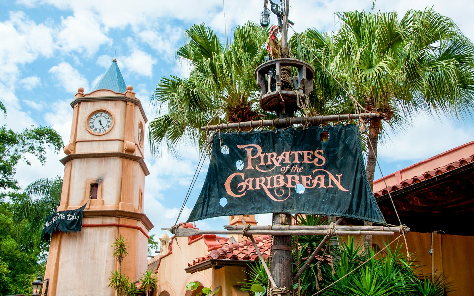 Pirates of the Caribbean entrance sign with clock tower at Walt Disney World Resort, Orlando.