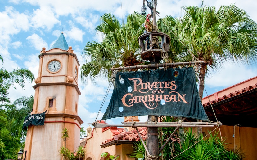 Pirates of the Caribbean entrance sign with clock tower at Walt Disney World Resort, Orlando.