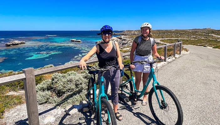 Ferry approaching Rottnest Island with clear blue waters, departing from Perth or Fremantle.