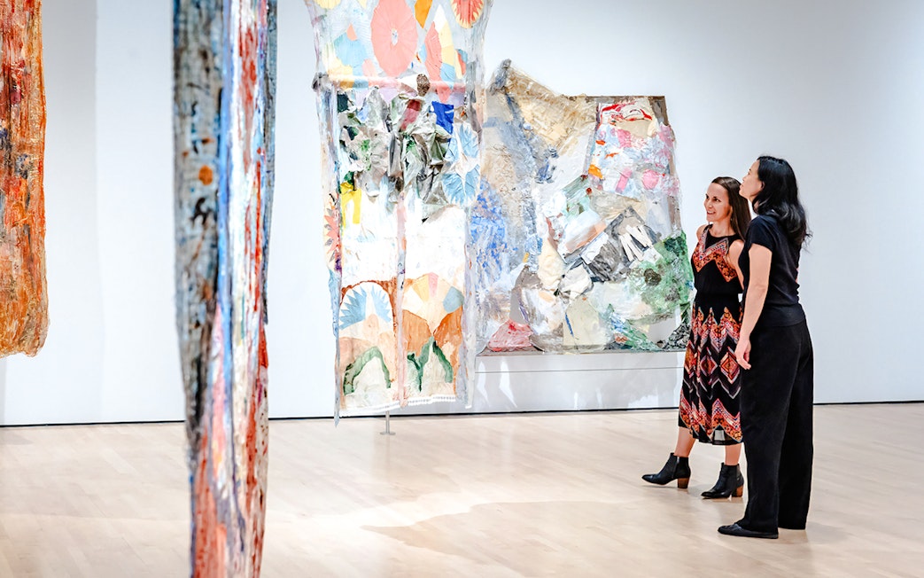 Visitors viewing abstract art at San Francisco Museum of Modern Art.