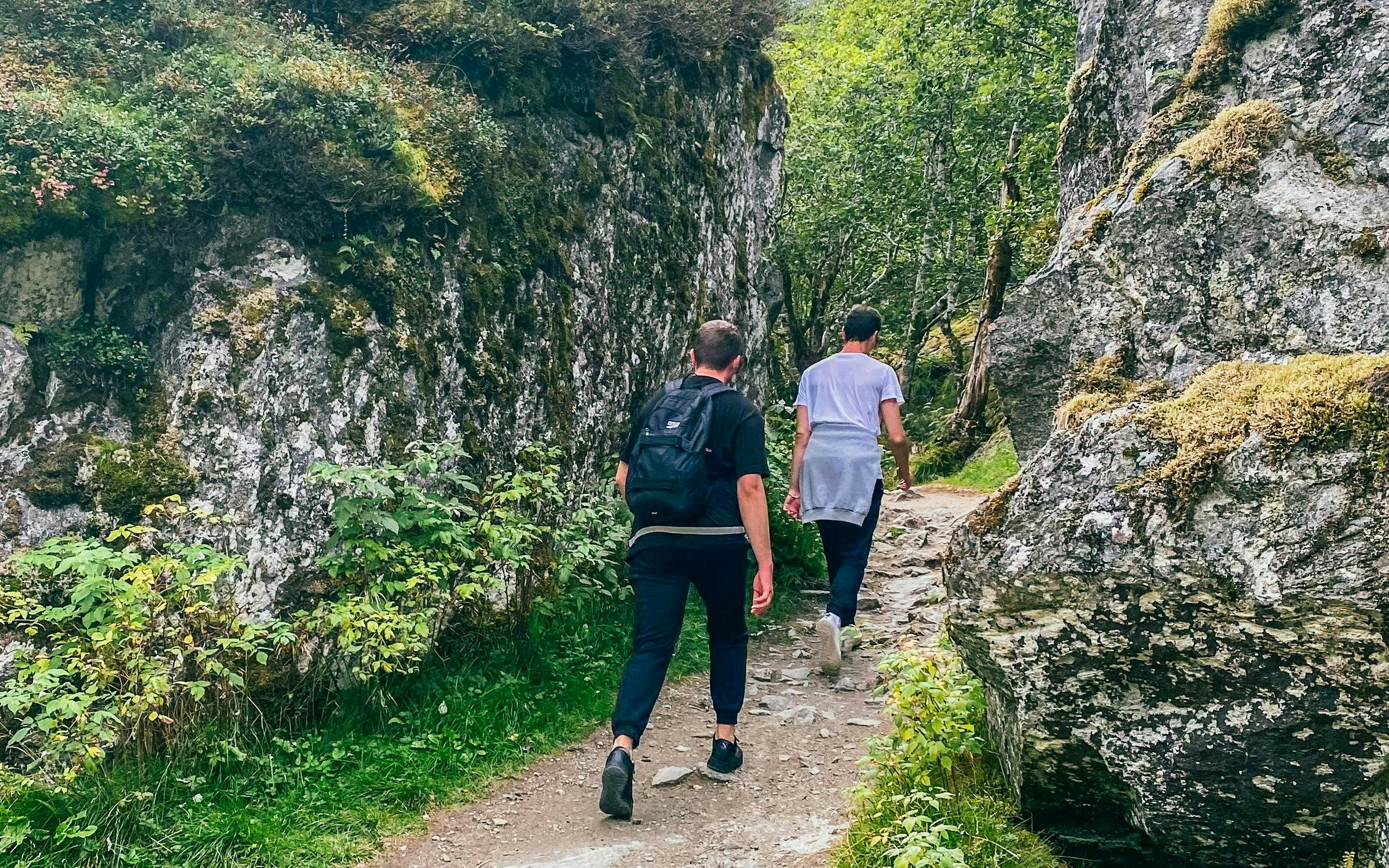 Hikers on a trail in Folgefonna National Park, Norway.