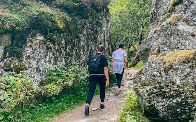 Hikers on a trail in Folgefonna National Park, Norway.