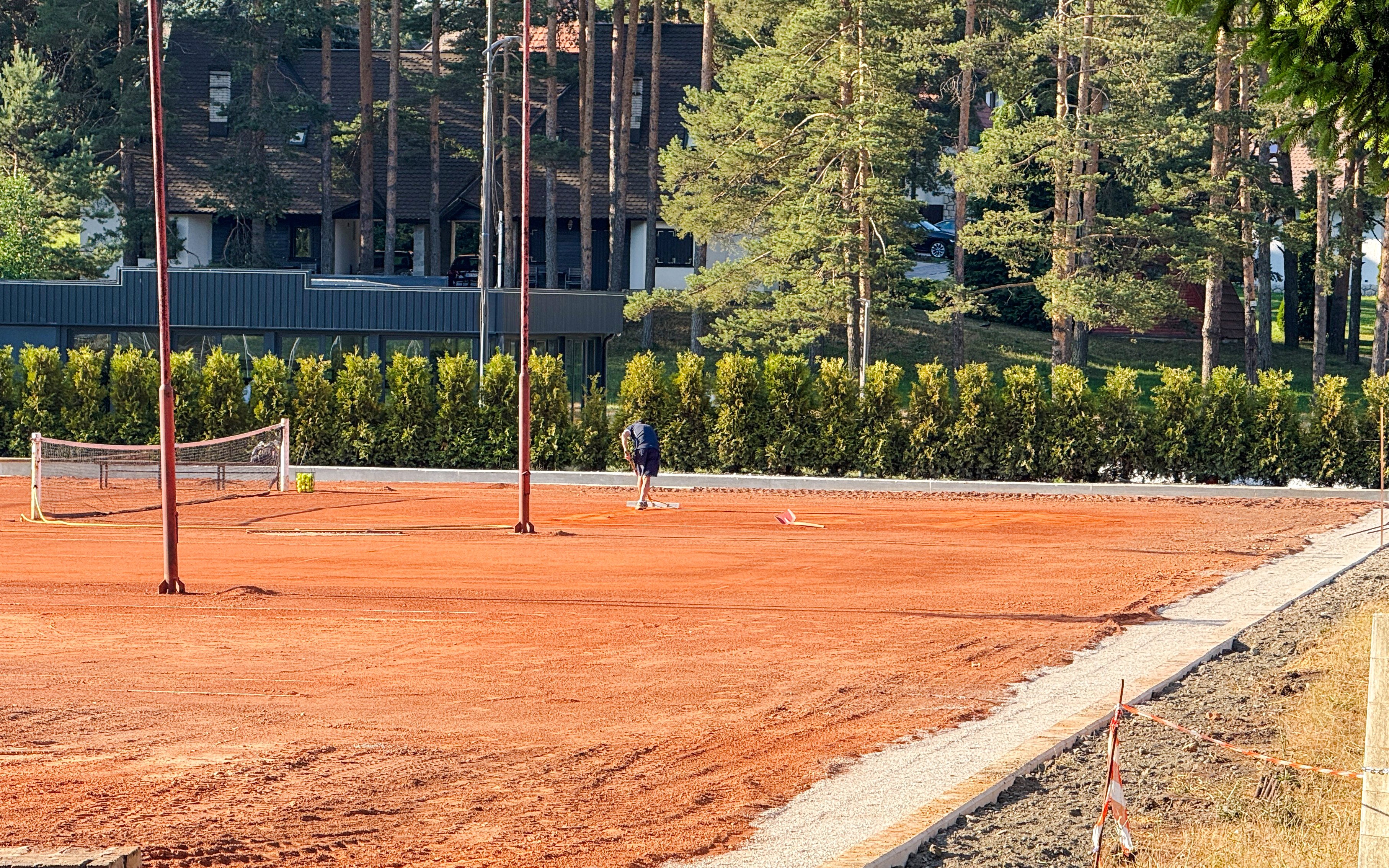 Tennis court maintenance at Garden of the Four Musketeers, Roland Garros.