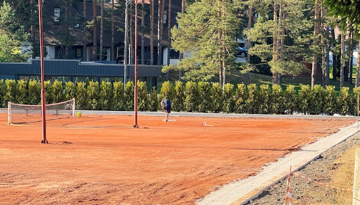 Tennis court maintenance at Garden of the Four Musketeers, Roland Garros.