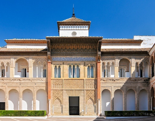 King Peter's Palace view from Patio de la Monteria, Alcazar Palace, Seville, Andalusia, Spain.