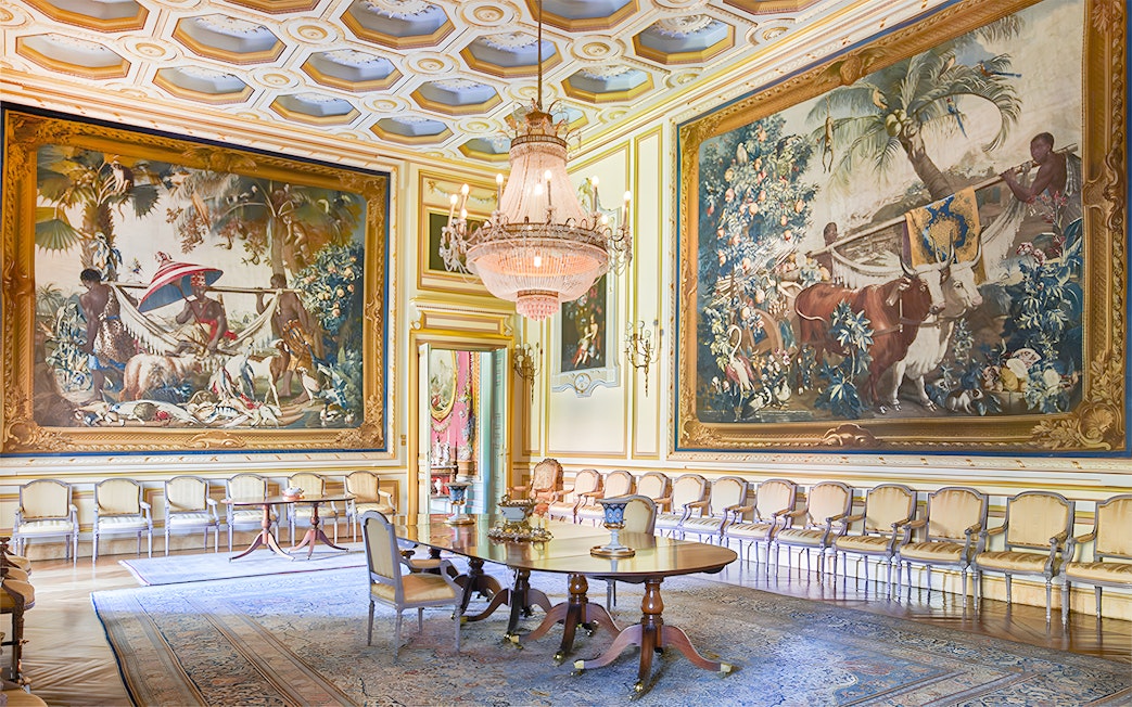 Large paintings in an ornate room at Liria Palace, Madrid.