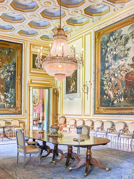 Large paintings in an ornate room at Liria Palace, Madrid.