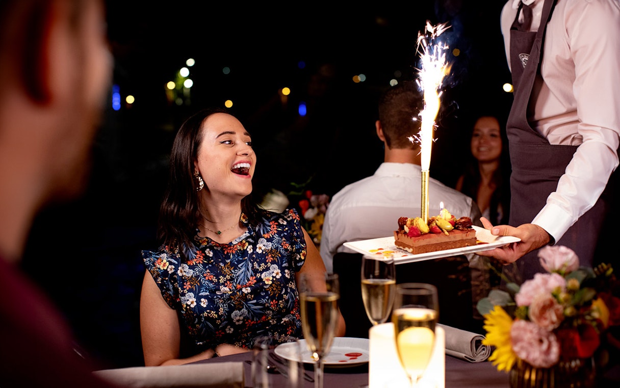Dinner cruise on the Seine with dessert and sparklers at night.