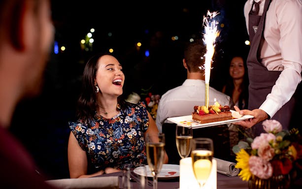 Dinner cruise on the Seine with dessert and sparklers at night.