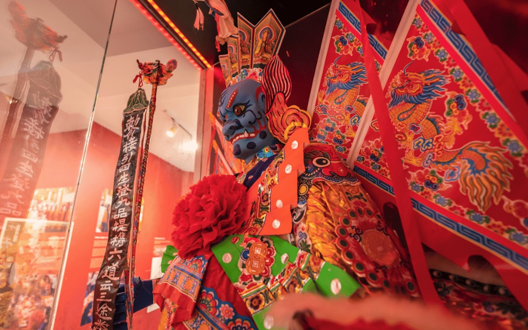 Blue-faced deity from Chinese mythology exhibit at Hell's Museum.