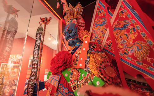 Blue-faced deity from Chinese mythology exhibit at Hell's Museum.