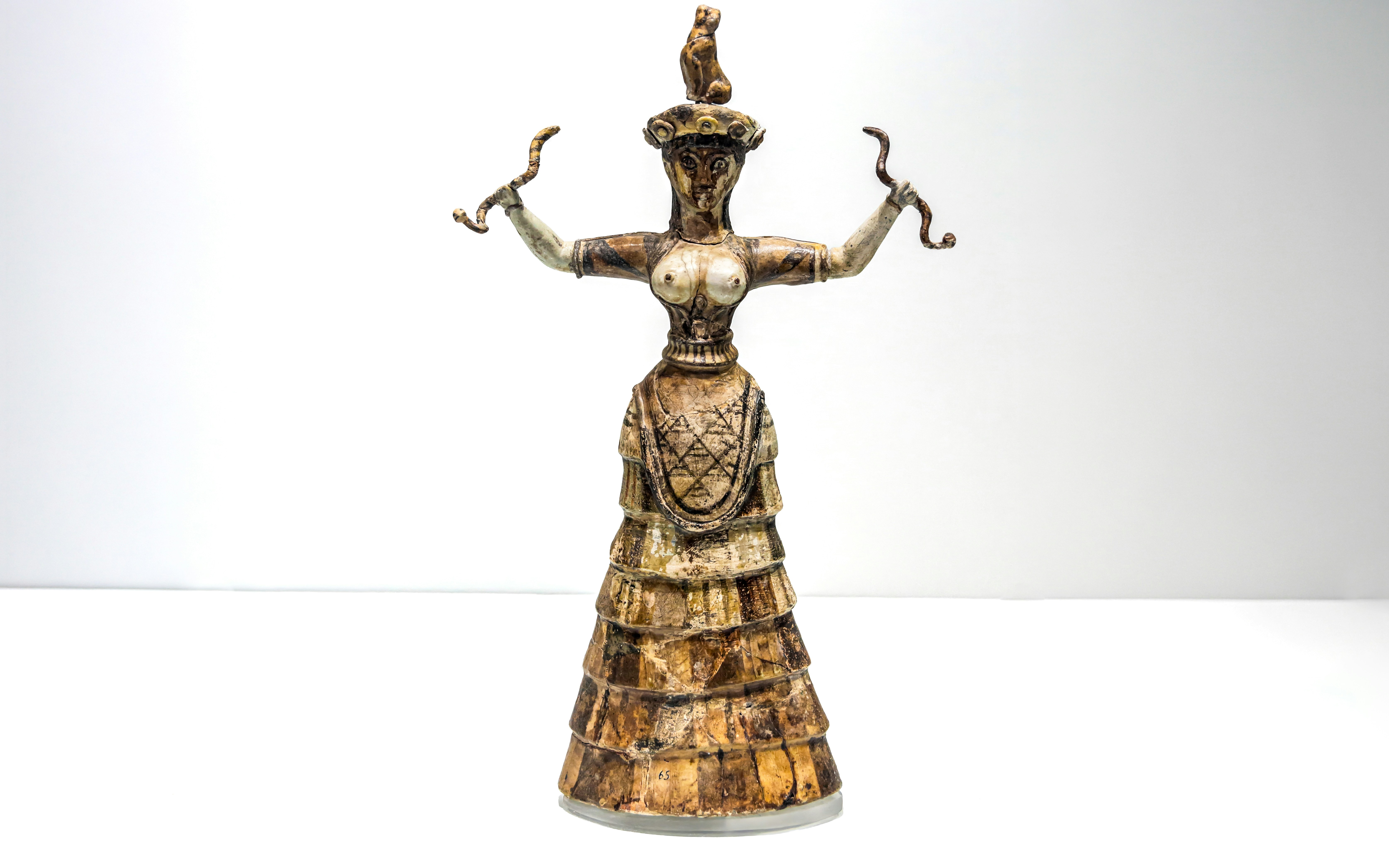 Minoan Snake Goddess figurine at Heraklion Archaeological Museum, Crete, Greece.
