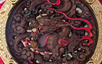 Intricate dragon carving at Asakusa temple, Tokyo, featured on the Tsukiji, Akihabara & Asakusa tour.