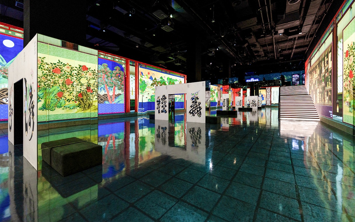 Arte Museum Dubai exhibit featuring vibrant Joseon paintings and calligraphy displays.