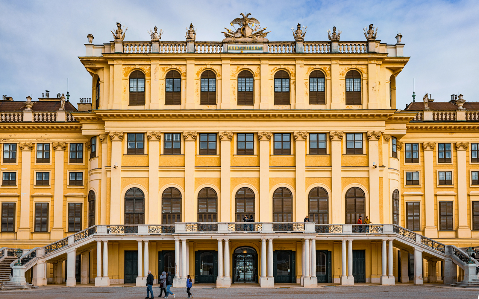 Schonbrunn Palace exterior with baroque architecture in Vienna, Austria.