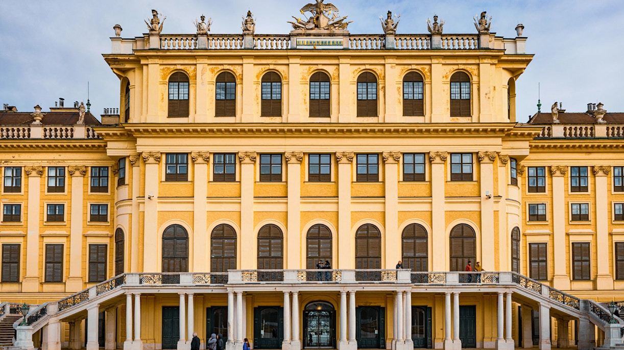 Schonbrunn Palace exterior with baroque architecture in Vienna, Austria.